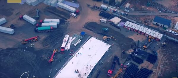 Скоростная стройка: таймлапс-видео первых дней возведения больницы в Ухане Скоростная стройка: таймлапс-видео первых дней возведения больницы в Ухане - Sputnik Беларусь