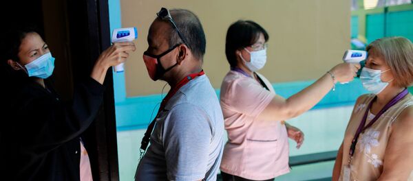 Гражданам Китая меряют температуру - Sputnik Беларусь