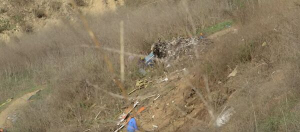 Опубликовано видео с места расследования крушения вертолета Коби Брайанта   - Sputnik Беларусь