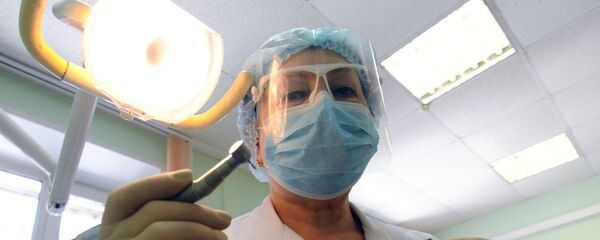 Стоматолог, архивное фото - Sputnik Беларусь