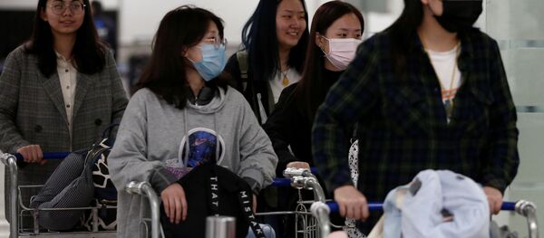 Китайские туристы в аэропорту - Sputnik Беларусь