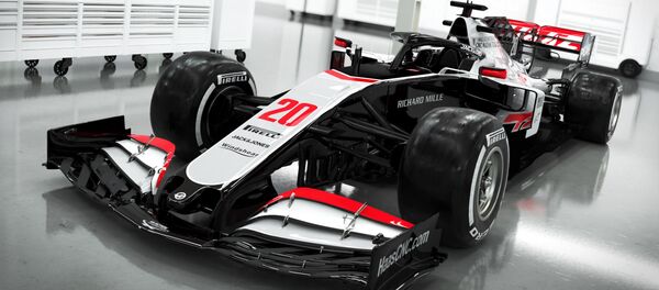 Команда Haas показала фото нового болида Команда Haas показала фото нового болида - Sputnik Беларусь