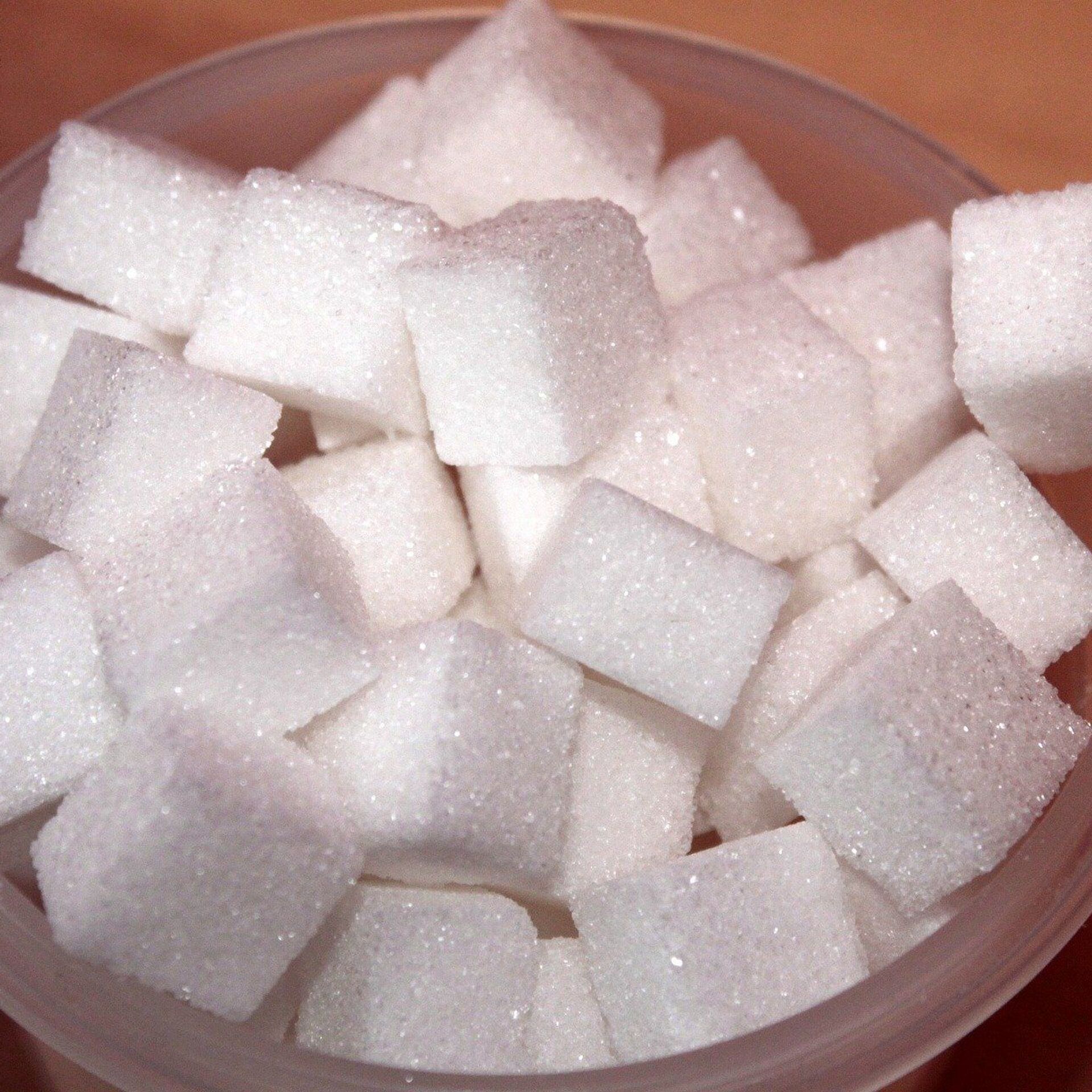 Сахар. Кусочек сахара. Сахар кубиками. Сахарный кубик.