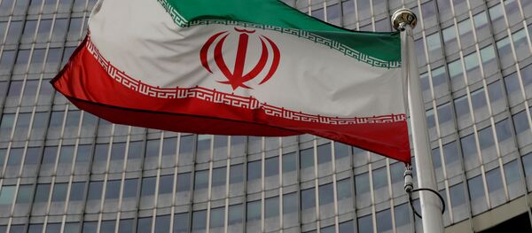 Флаг Ирана перед штаб-квартирой МАГАТЭ в Вене - Sputnik Беларусь