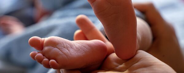 Младенец, архивное фото Младенец, архивное фото - Sputnik Беларусь