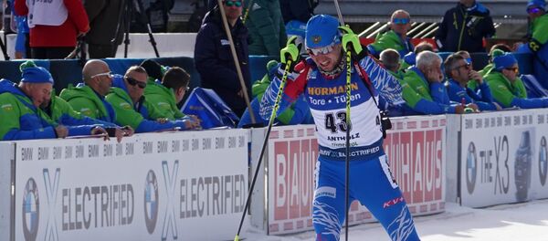 Александр Логинов (Россия) на дистанции спринтерской гонки - Sputnik Беларусь