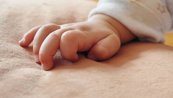Рука младенца, архивное фото - Sputnik Беларусь