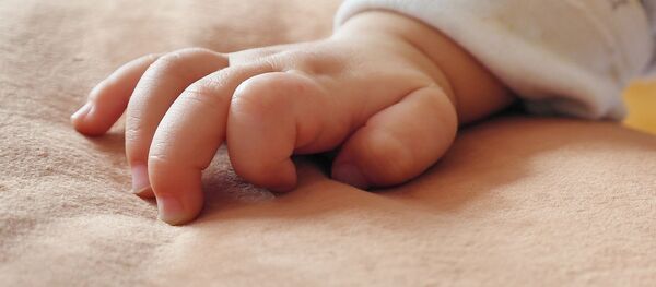 Рука младенца, архивное фото - Sputnik Беларусь