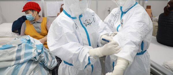Медики в больнице Уханя Медики в больнице Уханя - Sputnik Беларусь