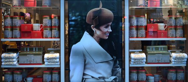 Фото Меган Маркл на витрине магазина - Sputnik Беларусь