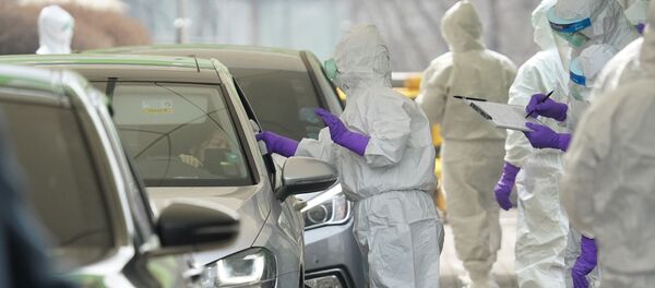 У Сеуле ўсіх вадзіцеляў правяраюць на каронавірус, 3 сакавіка 2020 года У Сеуле ўсіх вадзіцеляў правяраюць на каронавірус, 3 сакавіка 2020 года - Sputnik Беларусь