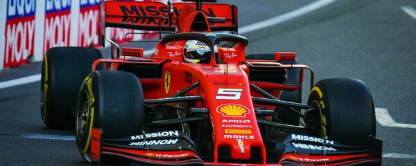 Болид Ferrari, архивное фото Болид Ferrari, архивное фото - Sputnik Беларусь