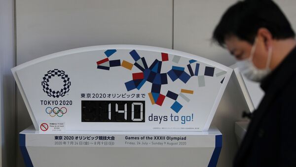Часы с обратным отсчетом до старта Олимпийских игр-2020 - Sputnik Беларусь