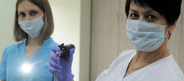 Врач-отоларинголог и медицинская сестра, архивное фото - Sputnik Беларусь