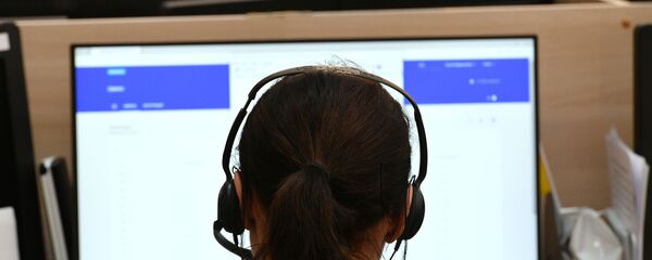 Сотрудник колл-центра, архивное фото - Sputnik Беларусь