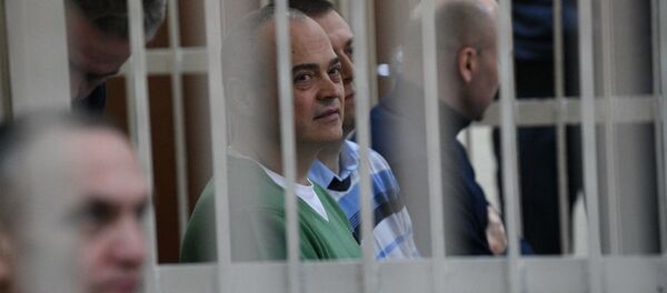 Феликс Касперович (в центре) на процессе по делу о взятках Феликс Касперович (в центре) на процессе по делу о взятках - Sputnik Беларусь