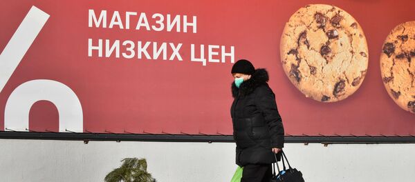 Жанчына ў масцы ў Мінску Жанчына ў масцы ў Мінску - Sputnik Беларусь