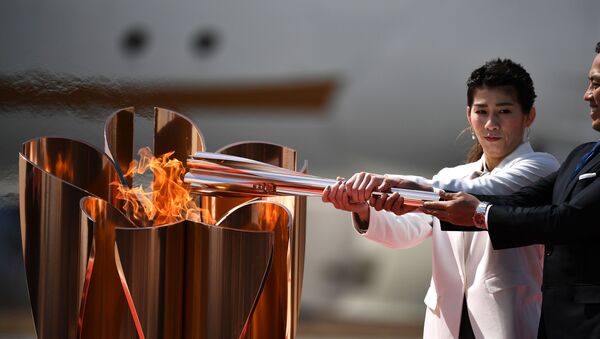 Олимпийский огонь доставили в Японию - Sputnik Беларусь