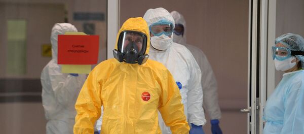 Пуцін наведаў бальніцу, дзе знаходзяцца пацыенты з падазрэннем на COVID-19 - Sputnik Беларусь