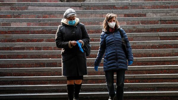 Женщины в защитных масках - Sputnik Беларусь