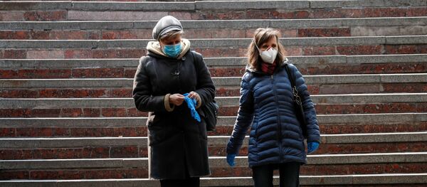 Женщины в защитных масках - Sputnik Беларусь