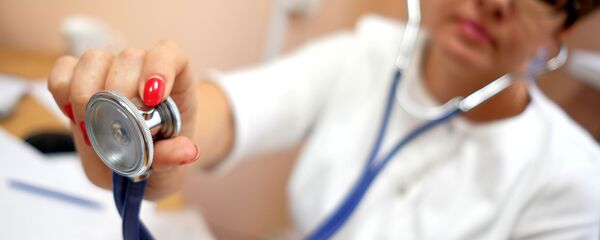 Урач у паліклініцы, архіўнае фота Урач у паліклініцы, архіўнае фота - Sputnik Беларусь