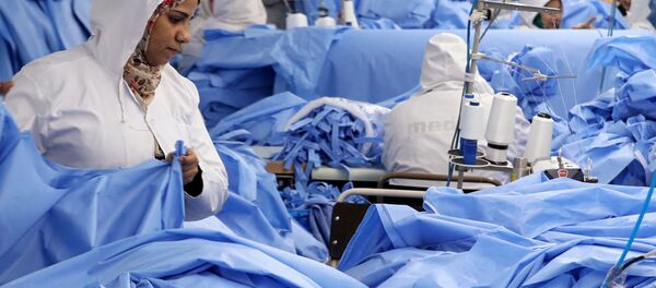 Пошив медицинских халатов в Египте - Sputnik Беларусь