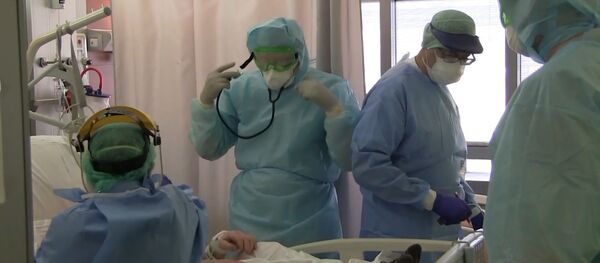 Российские военные готовятся к приему пациентов в Бергамо - видео - Sputnik Беларусь