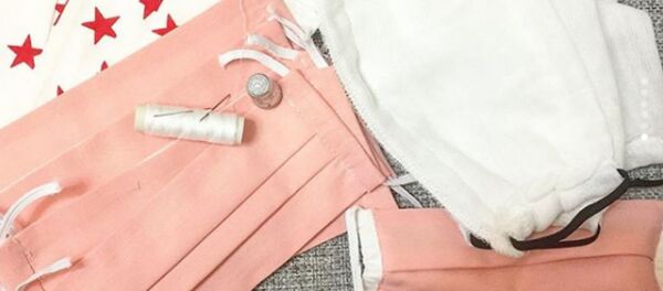 Маски, которые шьет предприниматель Сергей для витебских медиков - Sputnik Беларусь