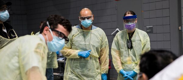 Приемка больного коронавирусом в американском госпитале - Sputnik Беларусь