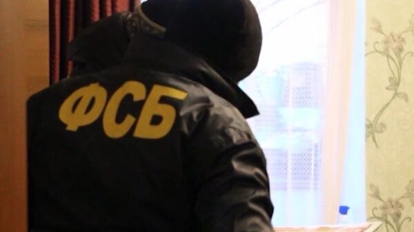 Сотрудники ФСБ России во время операции по задержанию преступников, архивное фото - Sputnik Беларусь