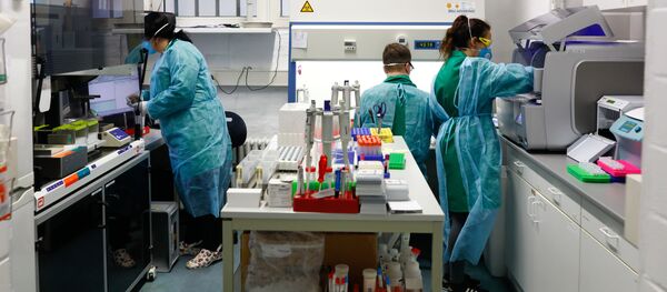 Сотрудники лаборатории в Берлине - Sputnik Беларусь