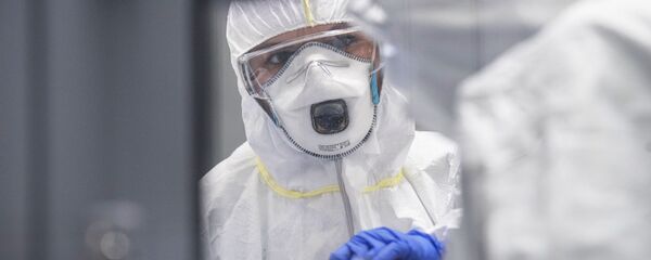 Тэсціраванне на каронавірусную інфекцыю, архіўнае фота Тэсціраванне на каронавірусную інфекцыю, архіўнае фота - Sputnik Беларусь