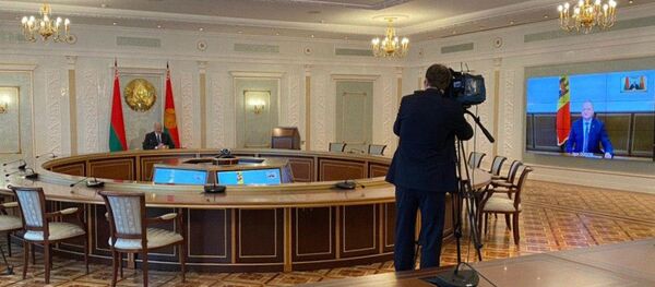 Президент Беларуси Александр Лукашенко в формате видеоконференции провел переговоры со своим молдавским коллегой Игорем Додоном - Sputnik Беларусь