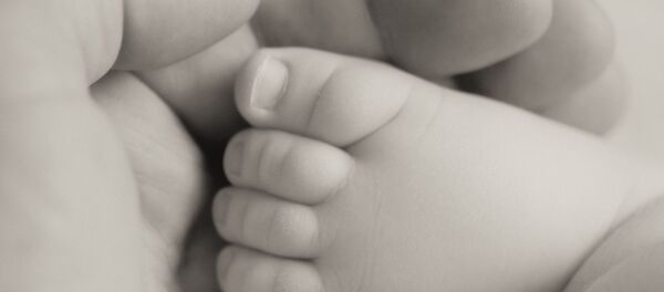 Детская ножка, архивное фото Детская ножка, архивное фото - Sputnik Беларусь