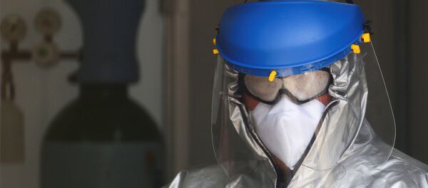 Медик в Мехико во время пандемии коронавируса Медик в Мехико во время пандемии коронавируса - Sputnik Беларусь