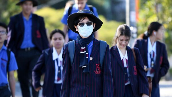 Студенты в защитных масках в Брисбене, Австралия - Sputnik Беларусь
