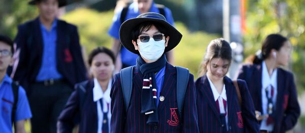 Студэнты ў ахоўных масках ў Брысбене, Аўстралія Студэнты ў ахоўных масках ў Брысбене, Аўстралія - Sputnik Беларусь