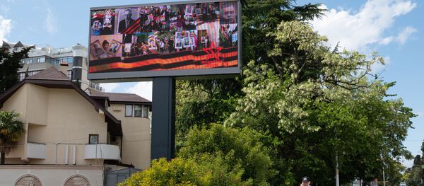 Медыяэкран з партрэтамі ўдзельнікаў Вялікай Айчыннай вайны - Sputnik Беларусь