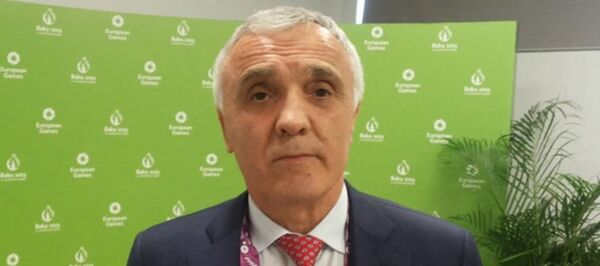 Главный тренер сборной России по женской борьбе Магомед Алиомаров Главный тренер сборной России по женской борьбе Магомед Алиомаров - Sputnik Беларусь