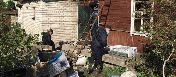 Следователи работают на месте пожара в Минске - Sputnik Беларусь