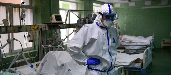 Врач и пациенты в отделении реанимации и интенсивной терапии - Sputnik Беларусь