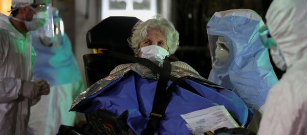 Госпитализация больной коронавирусом в Аргентине Госпитализация больной коронавирусом в Аргентине - Sputnik Беларусь