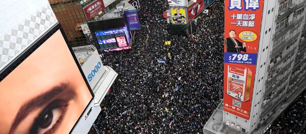 Люди вышли на марш в Гонконге в День прав человека - Sputnik Беларусь