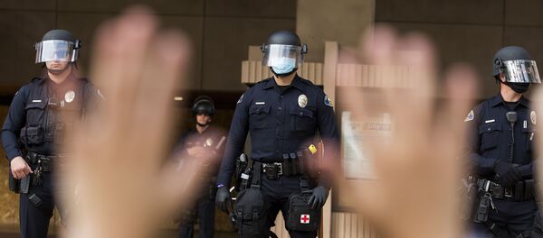 Полиция во время протестов в США Полиция во время протестов в США - Sputnik Беларусь