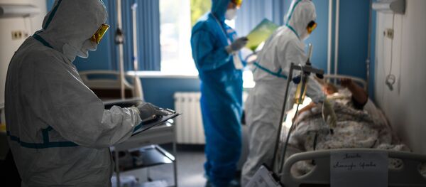 Урачы каля ложка пацыента Урачы каля ложка пацыента - Sputnik Беларусь