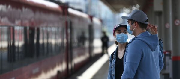 Пассажиры на платформе Павелецкого вокзала в Москве Пассажиры на платформе Павелецкого вокзала в Москве - Sputnik Беларусь