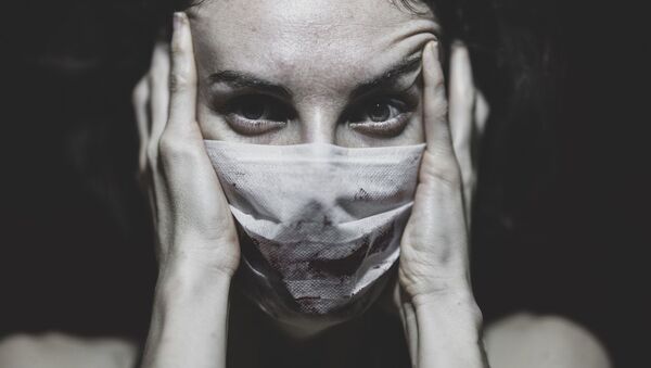 Женщина в маске, архивное фото - Sputnik Беларусь