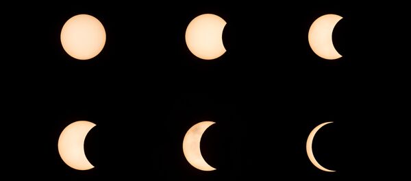 Движение Луны во время затмения 21 июня, которое можно было увидеть в Гонконге - Sputnik Беларусь