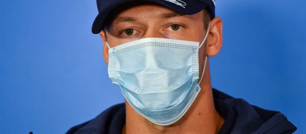 Российский гонщик Формулы-1 Даниил Квят Российский гонщик Формулы-1 Даниил Квят - Sputnik Беларусь